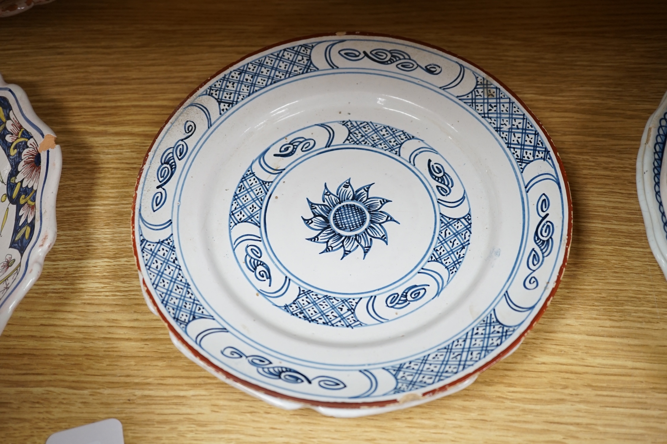 A collection of twenty 18th/19th century French faience polychrome and blue and white Revolution commemorative plates and three others, largest 27cm diameter (23). Condition - condition varies poor to good